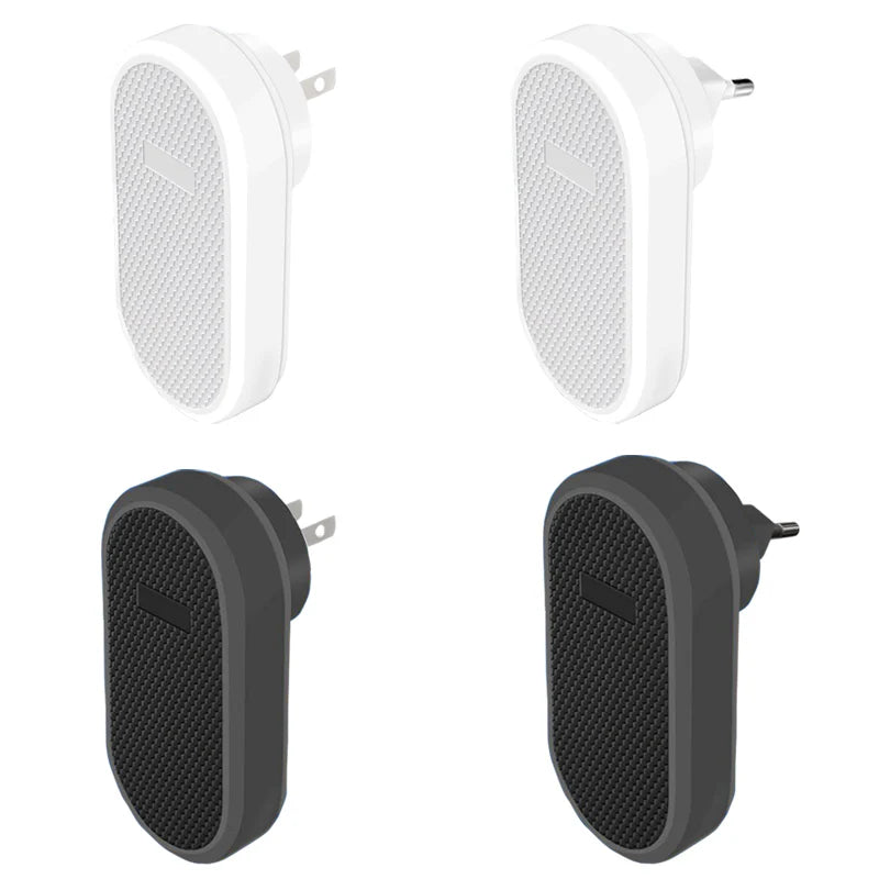 Pair of white and black plug-in wireless doorbells with a textured speaker grille.