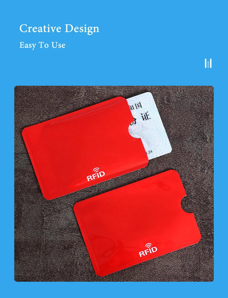 Two bright red RFID-blocking card sleeves made of thin, smooth material with a thumb cut-out for easy access.