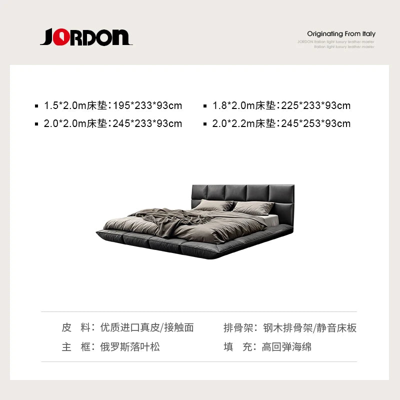 Modern floating king-size bed in black leather, featuring a sleek low-profile frame and a cushioned headboard.