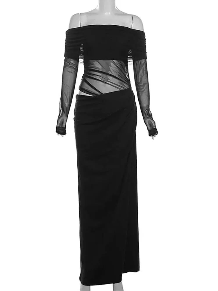 Black slash-neck long-sleeve maxi dress with sheer mesh midsection, asymmetrical cutouts, and ruched skirt.
