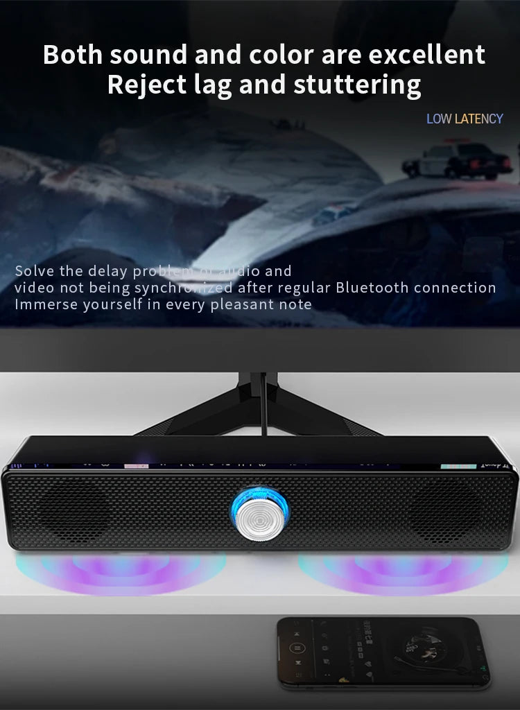 Sleek black USB-powered stereo soundbar with a central illuminated volume dial and subtle blue under-glow lighting.