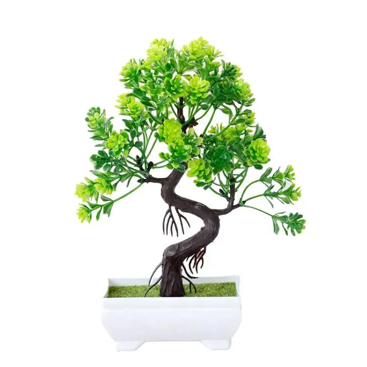 Small artificial bonsai tree with bright green plastic foliage and a dark brown trunk in a white rectangular pot.