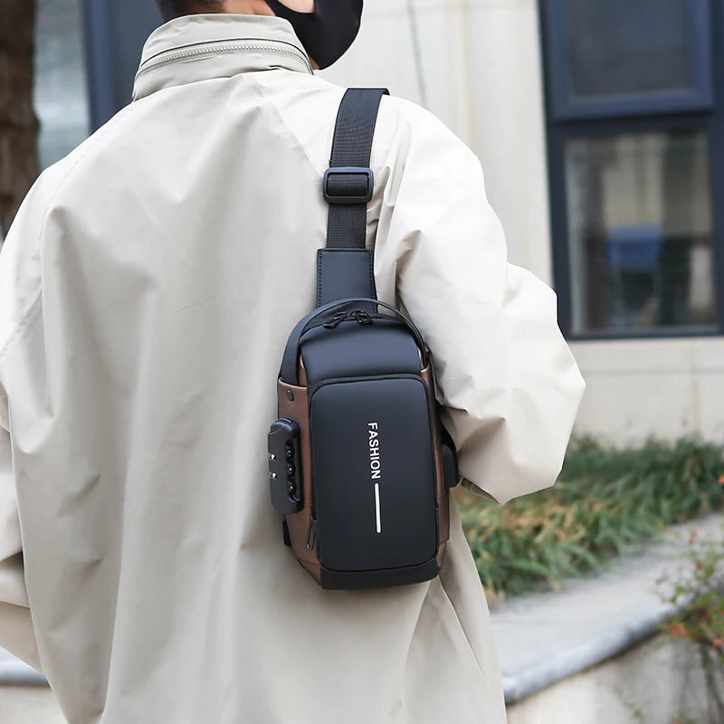 Black and brown anti-theft crossbody chest bag worn on a person, featuring a combination lock and USB charging port.