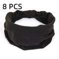 A pack of 8 black fabric elasticated headbands with a ruched, wide-fit design on a white background.