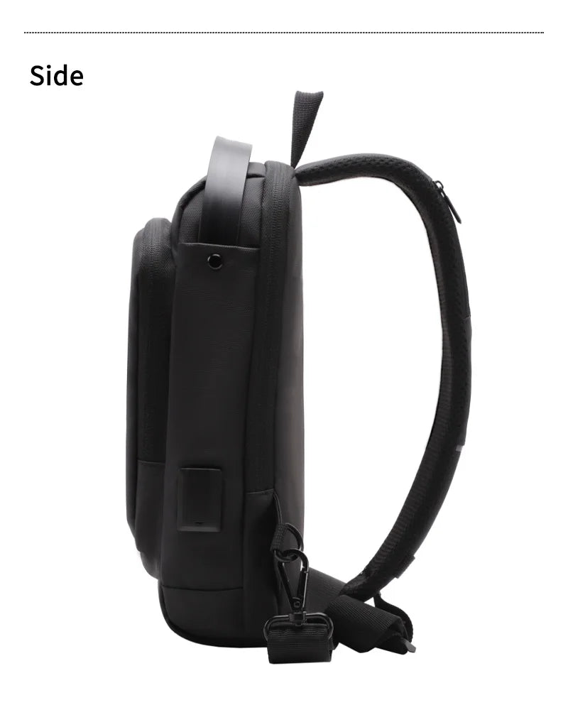 Side view of a black waterproof sling bag with an integrated USB charging port and adjustable padded shoulder strap.