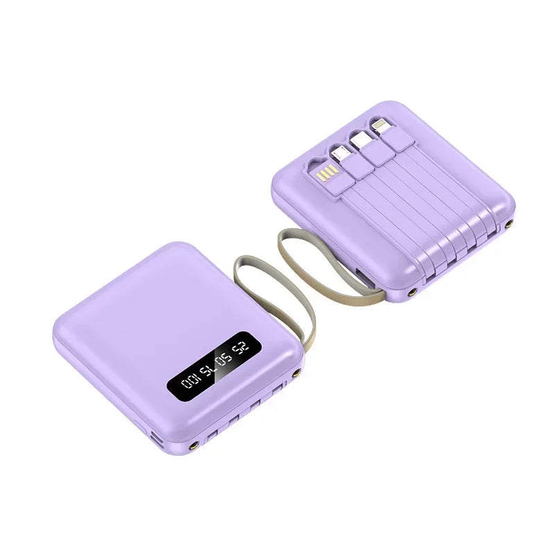 Compact lilac portable power bank with a digital display and integrated charging cables.
