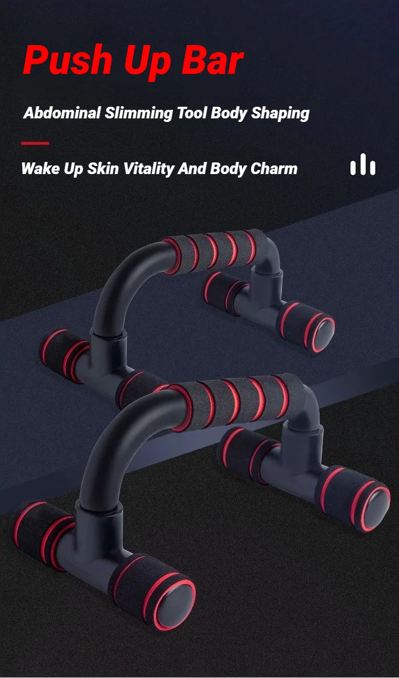 Two black push-up bars with red foam-padded handles, shown on a dark background.