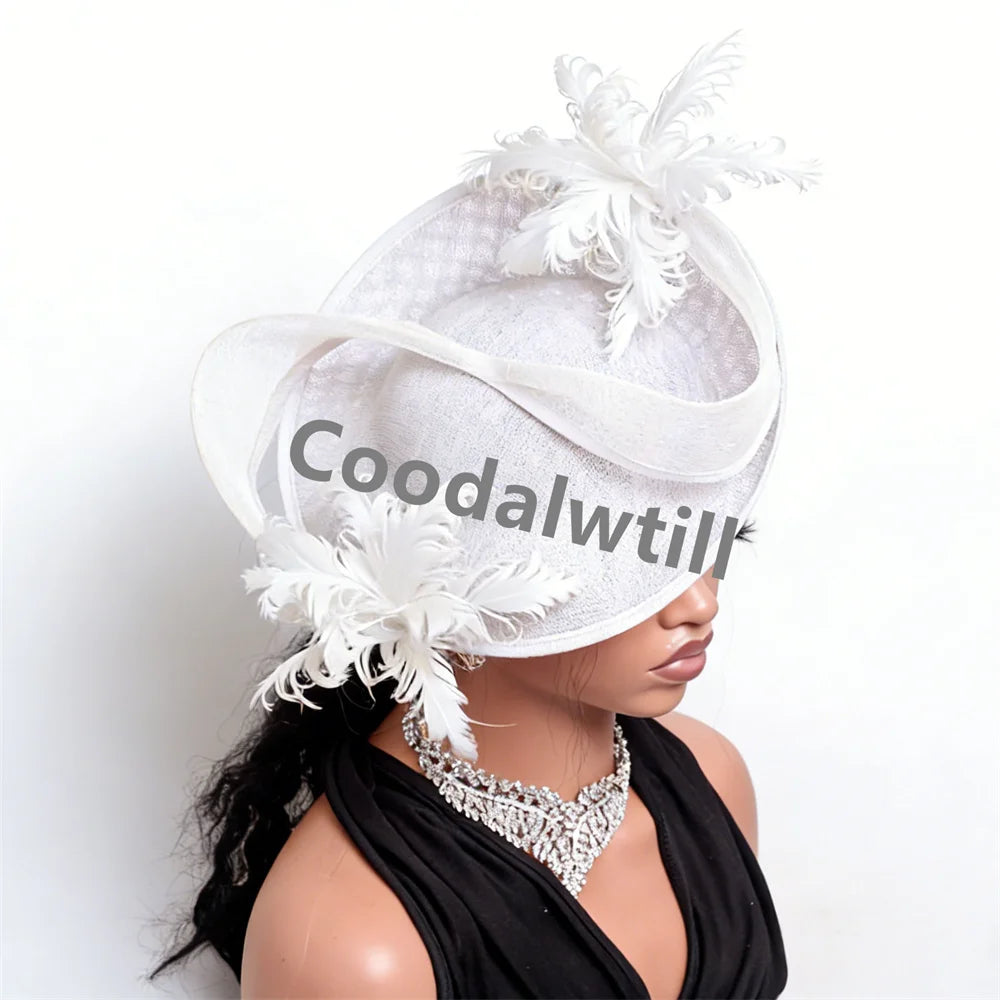 Elegant white fascinator hat with sculpted brim, organza ribbon detailing, and delicate feather accents.
