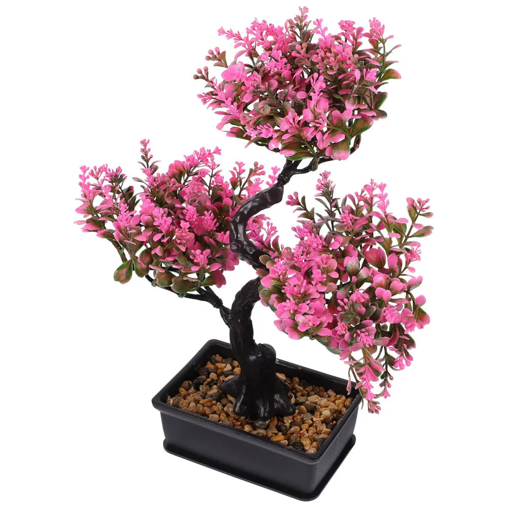 Artificial pink-flowered bonsai tree in a small rectangular black pot with decorative pebbles.