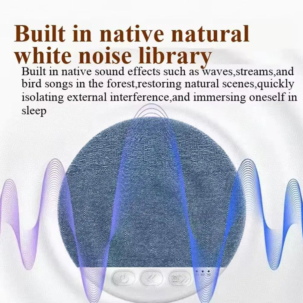 Round, blue fabric-covered wireless pillow speaker with white base, control buttons, and blue sound wave graphics.