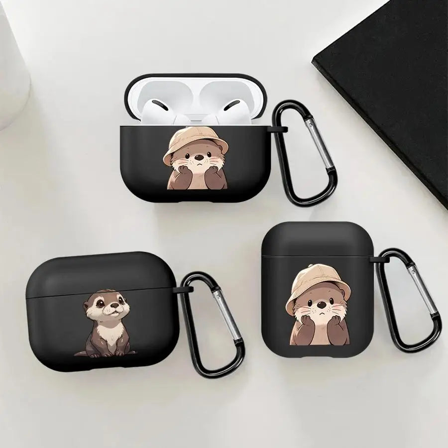 Black silicone AirPods Pro and standard cases featuring a cute otter illustration, complete with a handy carabiner clip.