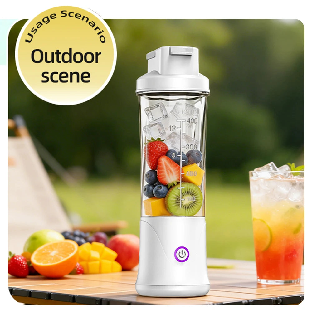 White portable personal blender filled with mixed fruit and ice, set outdoors on a table.