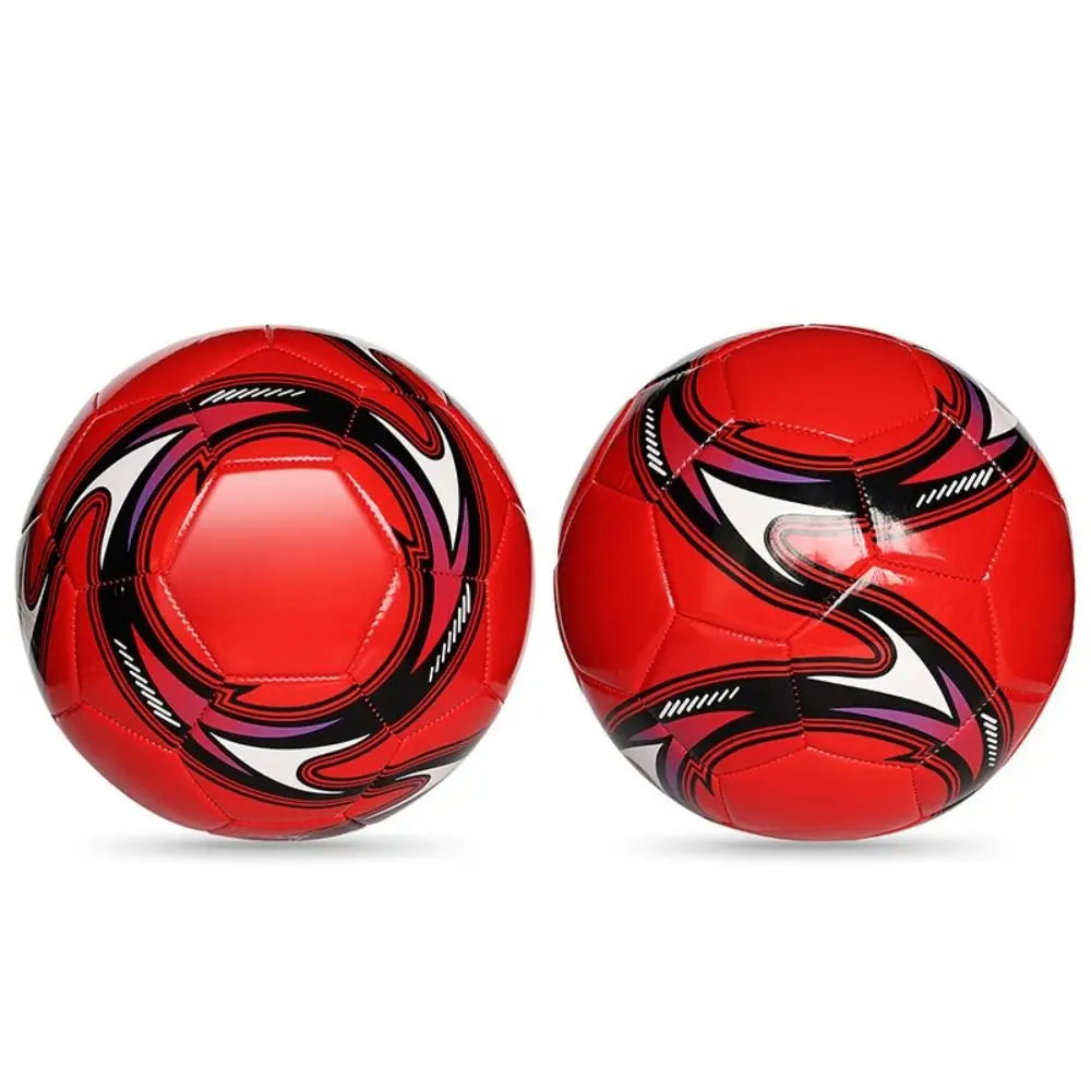 Two red footballs featuring a bold, graphic black and white curved panel design.