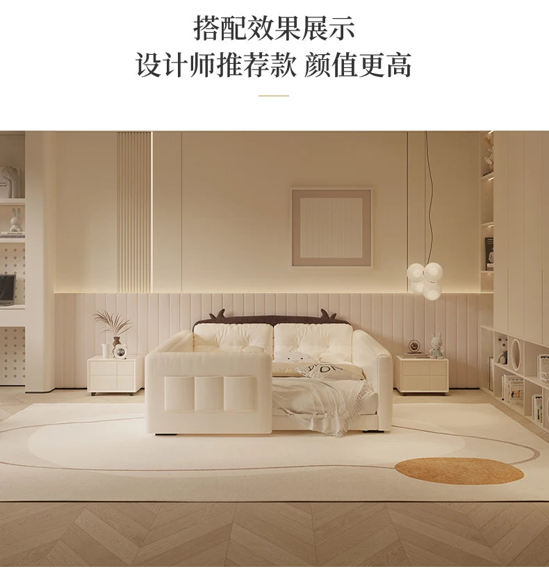 Cream-coloured parent-child bed with a cow-themed headboard, protective side guardrail, and soft, cushioned design.
