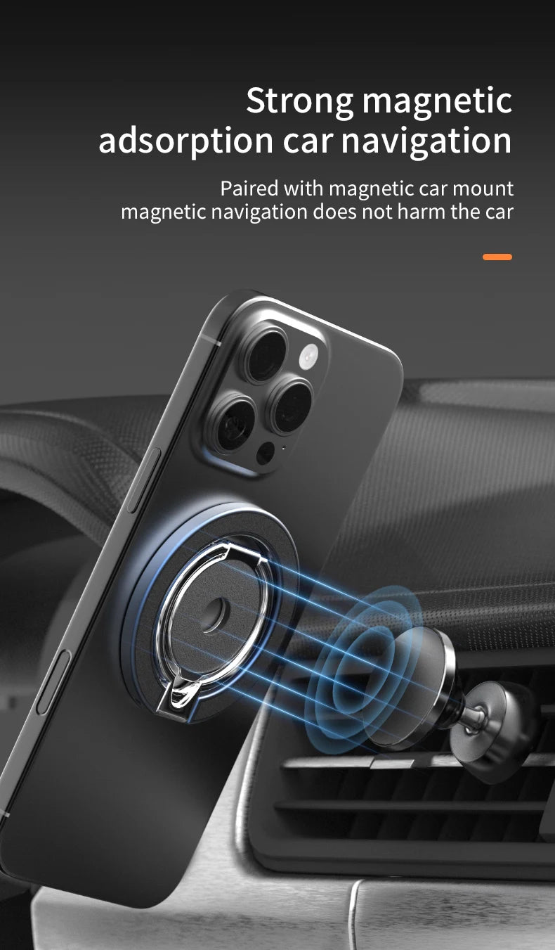 A black smartphone with a metallic magnetic ring mount attached to the back, connecting to a car dashboard air vent.