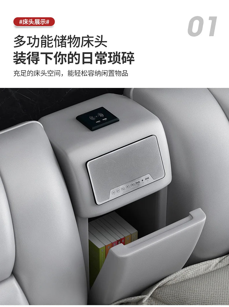 Close-up of a grey upholstered headboard with a built-in storage compartment, integrated speaker, and charging pad.