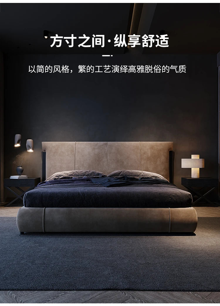 Minimalist dark grey bedside table with a sleek X-frame base and storage surface, set in a modern bedroom.
