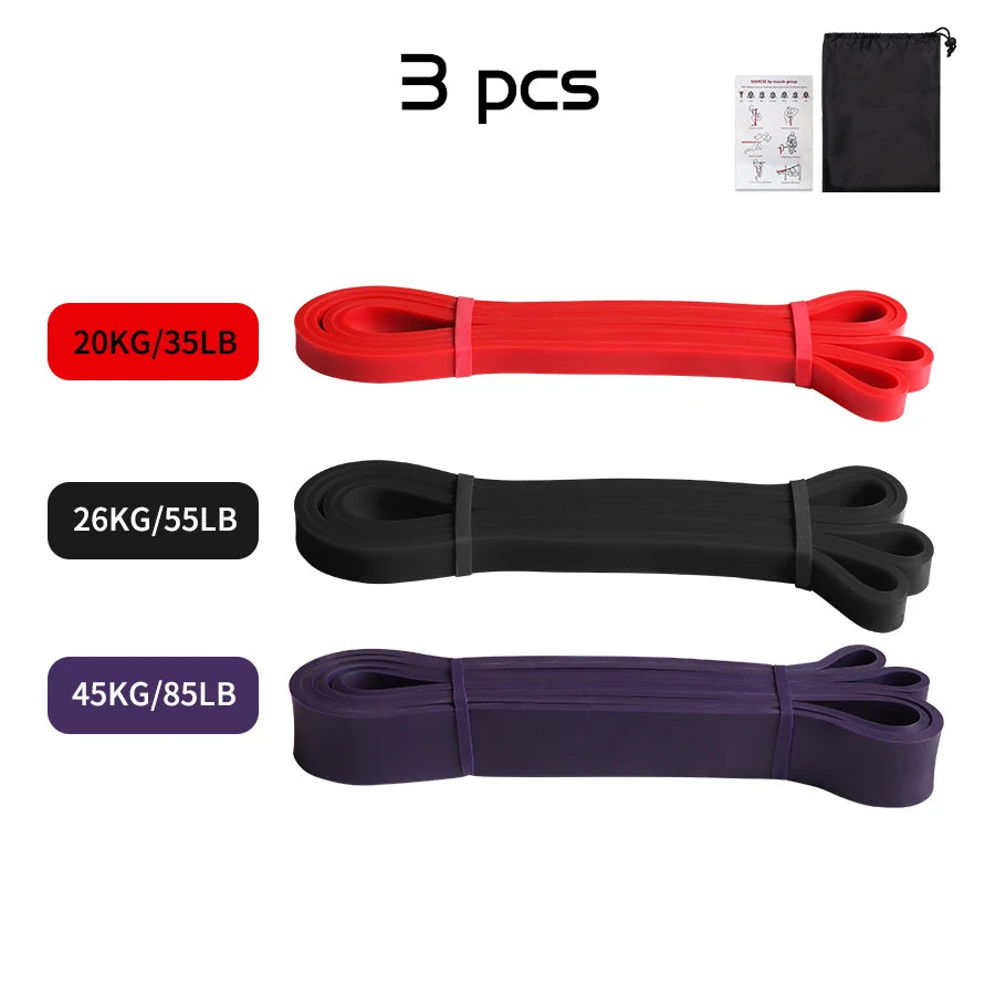 Set of 3 resistance bands in red (20kg), black (26kg), and purple (45kg), with a carry bag and exercise guide.