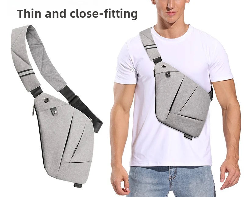 Slim grey waterproof crossbody messenger bag worn over the shoulder, featuring an anti-theft, close-fitting design.