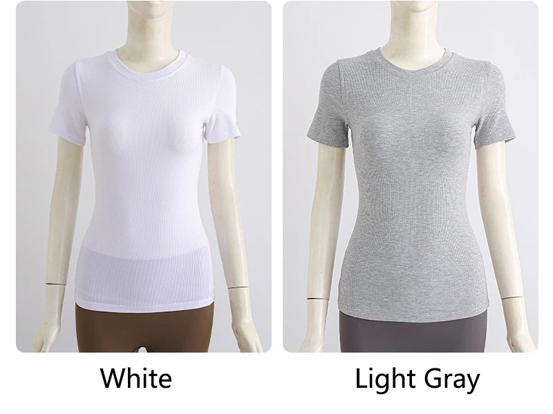 Two ribbed, short-sleeve crew neck t-shirts on mannequins, shown in white and light gray.