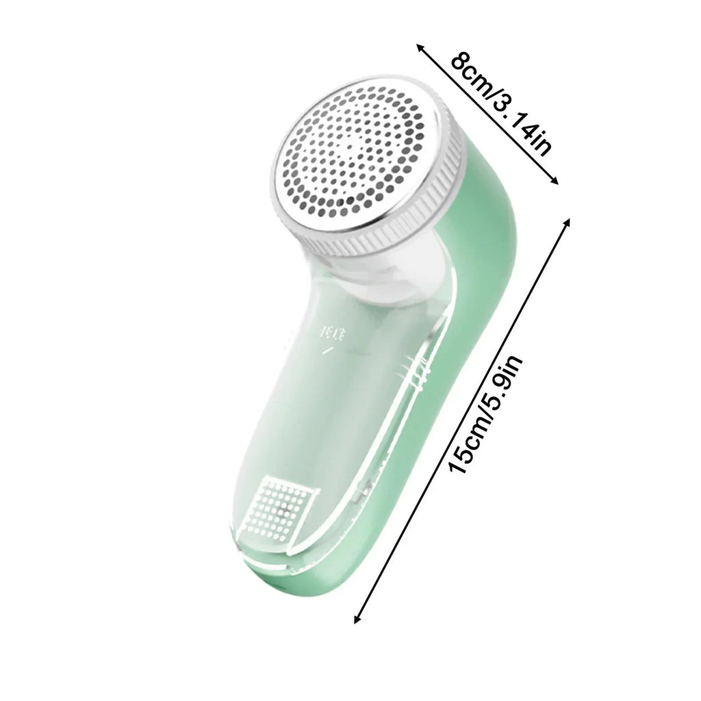 A sage green fabric shaver with a silver honeycomb shaving head, showing dimensions of 8cm by 15cm.