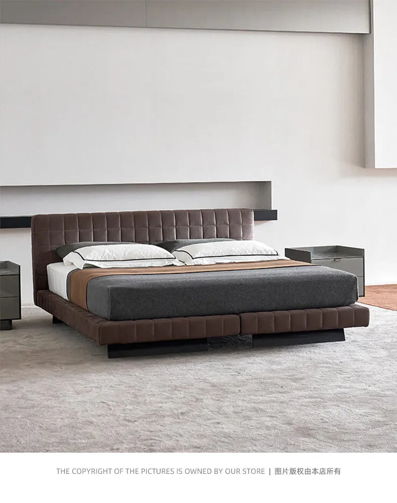 Modern Nordic upholstered bed frame in chocolate brown with a tufted headboard and low-profile design.