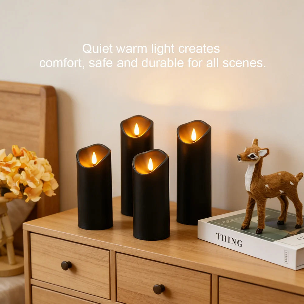 Four black flameless LED pillar candles with melting-edge tops and warm, glowing realistic flames on a table.