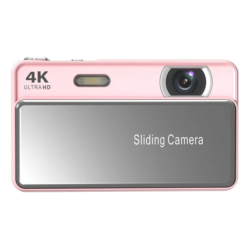 Light pink plastic 4K digital camera with a gray sliding lens cover, flash, and Ultra HD text on the front.