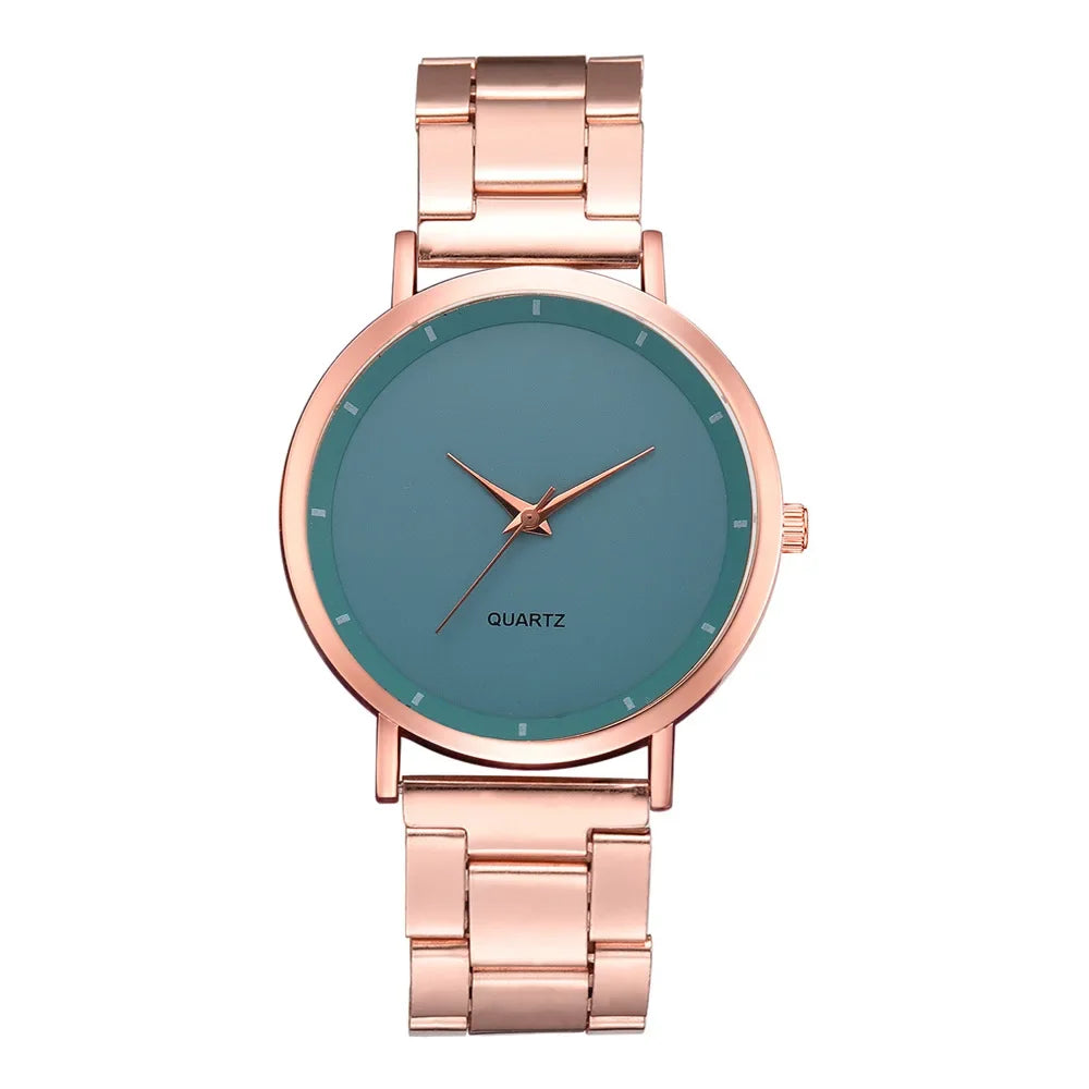Ladies' rose gold stainless steel watch with a minimalist teal face and matching rose gold hands.