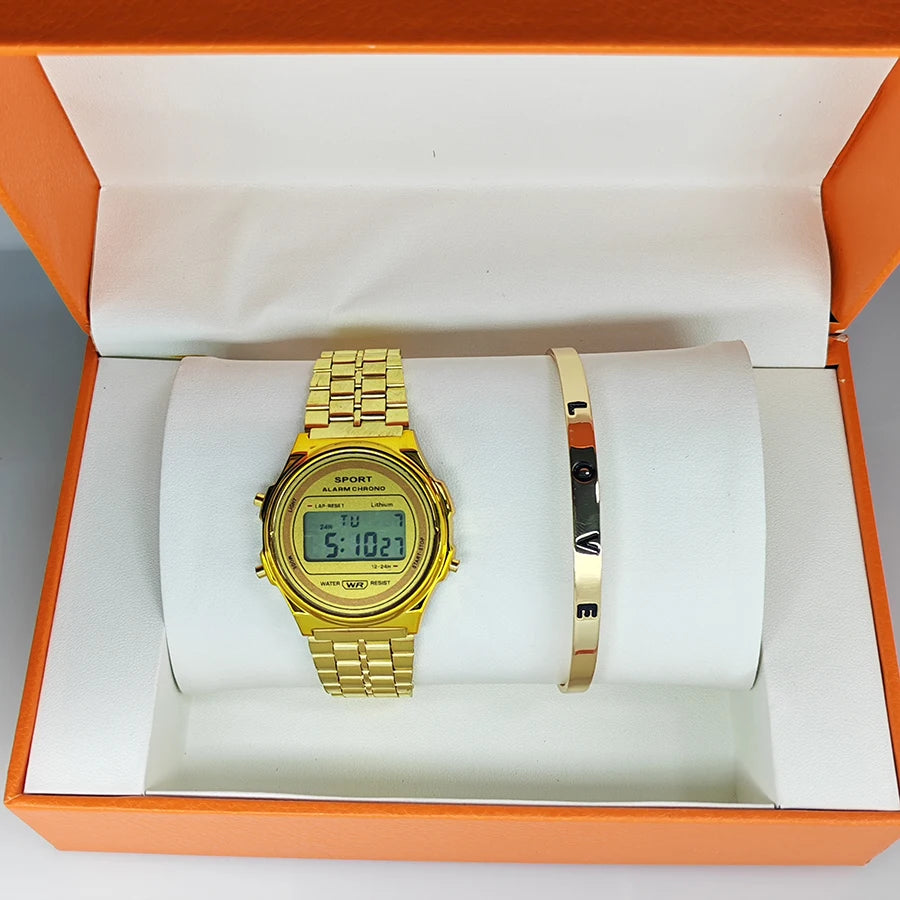 Gold-tone retro digital watch with link strap and matching 'LOVE' bangle presented in an orange gift box.