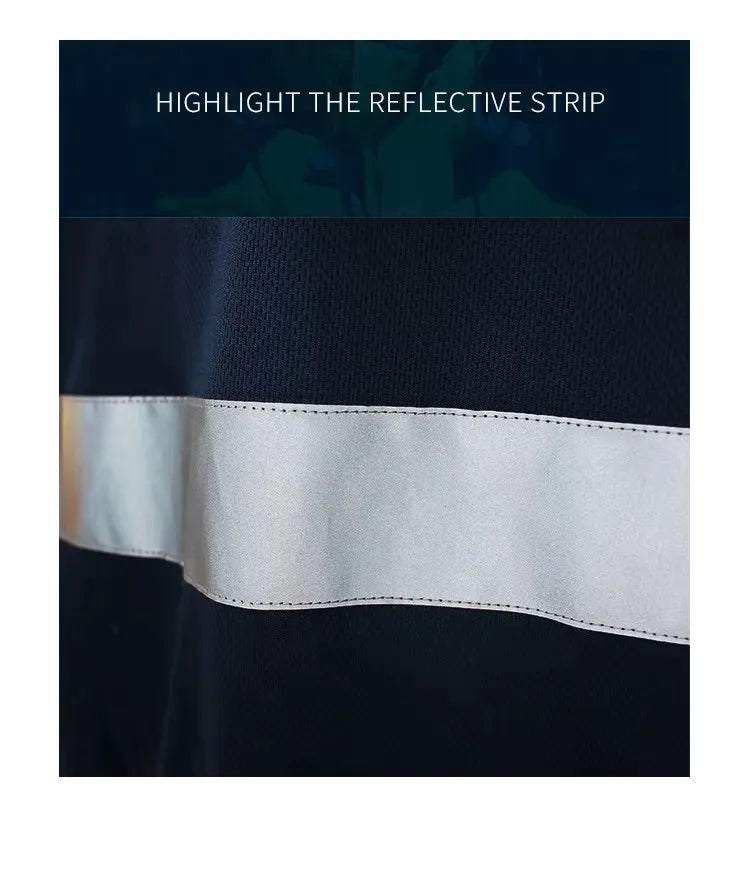Close-up of a navy blue hi-vis work shirt featuring a wide, stitched-on silver reflective strip.