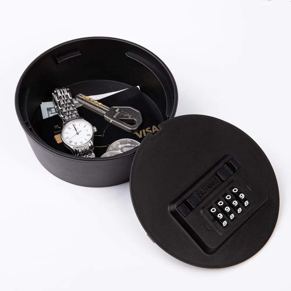 Black cylindrical plastic storage container with a combination lock lid, holding a watch, keys, and cards.