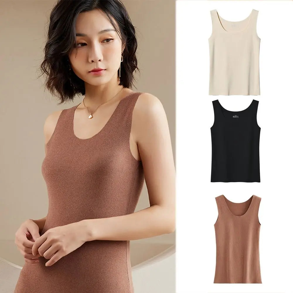 Model wearing a seamless, scoop-neck sleeveless vest in beige, black, and brown. Soft, fitted base layer tank tops.