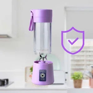 Portable lavender purple blender with a clear cup and carry strap, shown with a purple safety shield checkmark icon.