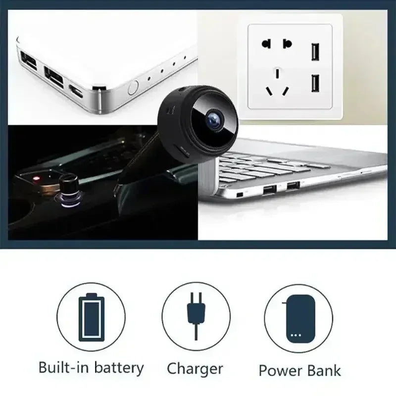 Small black circular security camera shown with power bank, wall charger, and laptop for charging and connectivity.