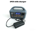 Gray portable power supply with a digital display and built-in handle, shown with its connected black power charger.