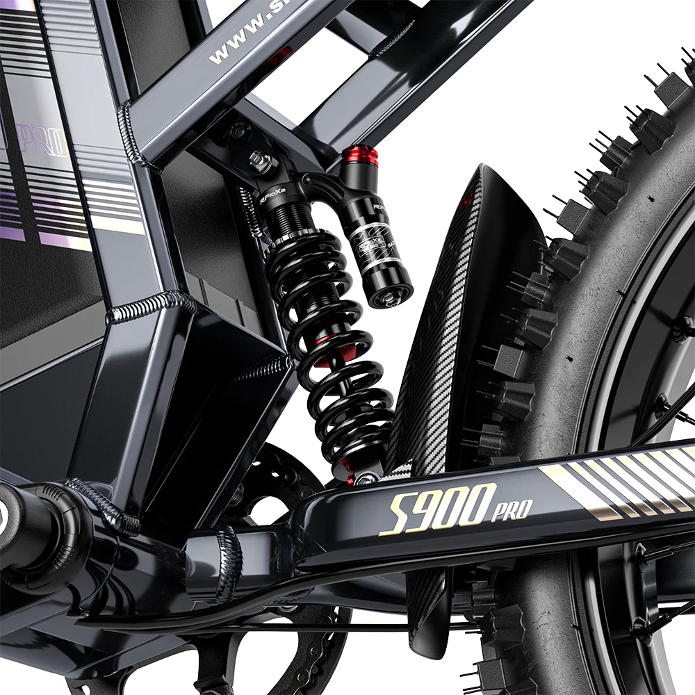 Shengmilo S900 Pro electric bike close-up, showing black rear suspension spring, frame, and knobby tire.