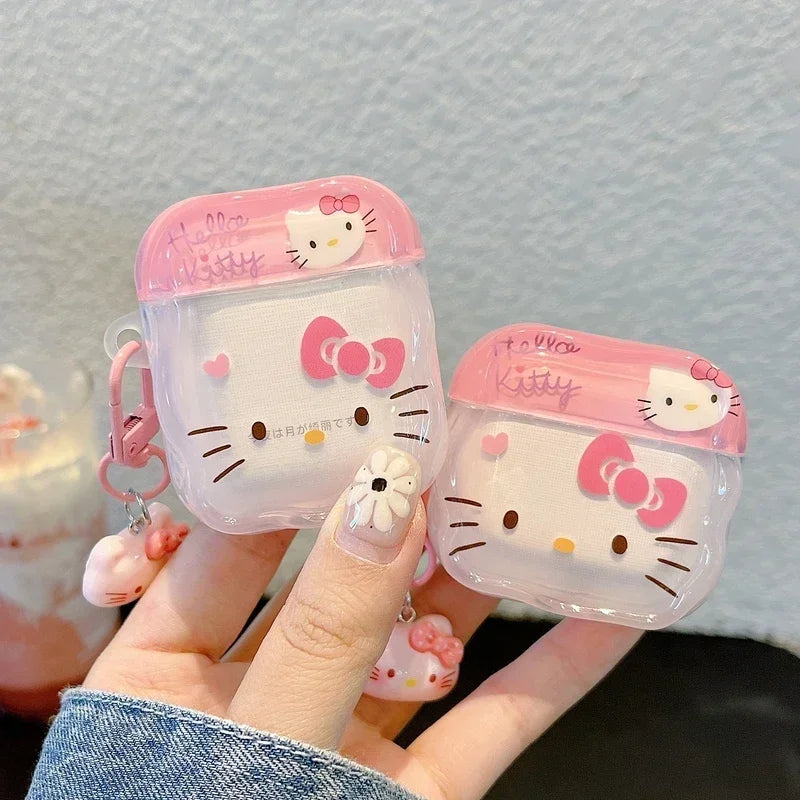 Clear pink Hello Kitty silicone AirPods case with matching charm, compatible with standard AirPods.
