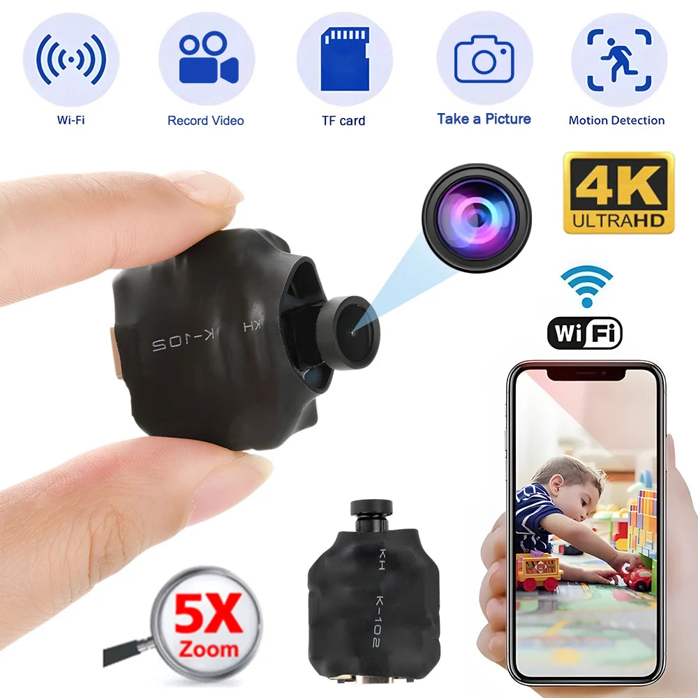 Small black plastic 4K WiFi security camera module with lens, motion detection, and mobile app connectivity.
