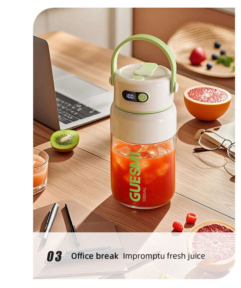 Portable 1000ml glass blender bottle with a green handle, digital temperature display, and white lid on a desk.