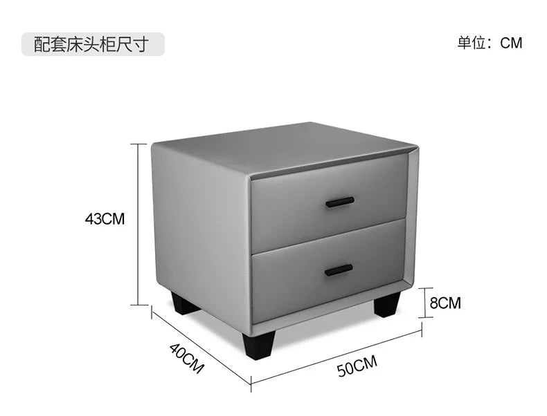 Minimalist grey upholstered bedside table with two drawers, black handles, and dark sturdy feet. Dimensions included.