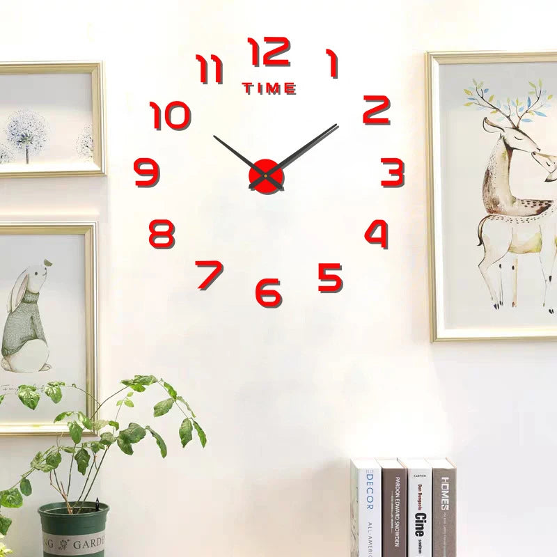 Modern DIY wall clock with vibrant red 3D-effect numbers and black hands, mounted on a white wall.
