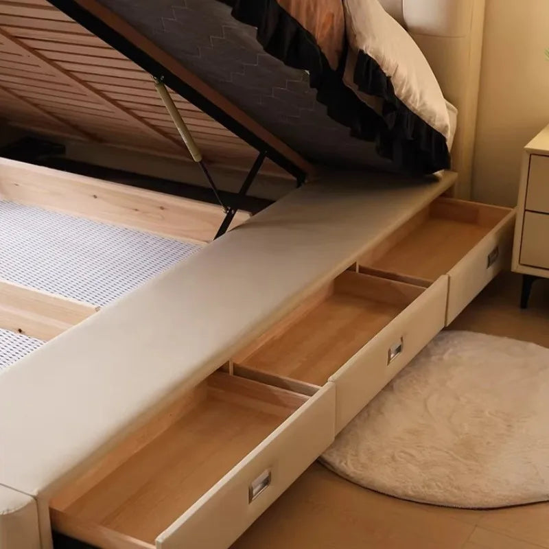 Minimalist cream storage bed frame with a gas-lift mechanism and integrated side drawers.