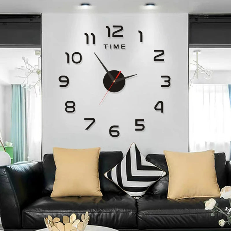 Large, modern frameless wall clock with black 3D numbers and clock hands installed on a white living room wall.