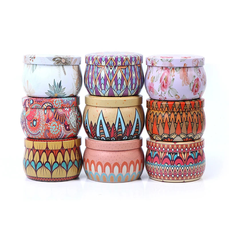 Set of nine round, decorative metal storage tins featuring assorted colourful floral, geometric, and bohemian patterns.