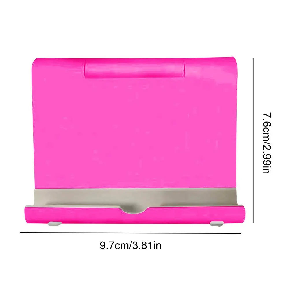 Bright pink folding phone or tablet stand, 9.7cm wide by 7.6cm high, with a grey supportive ledge.