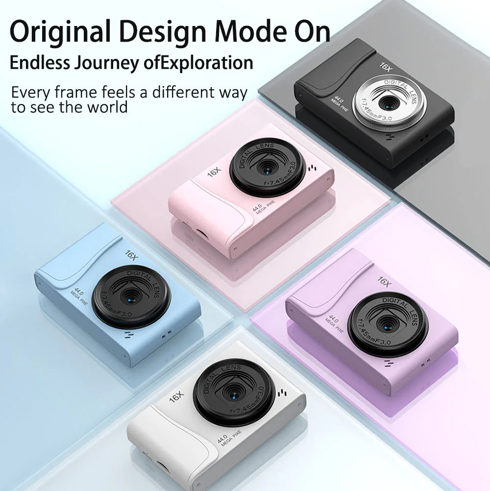 Five compact plastic digital cameras in black, pink, blue, purple, and white with 16x zoom lenses.