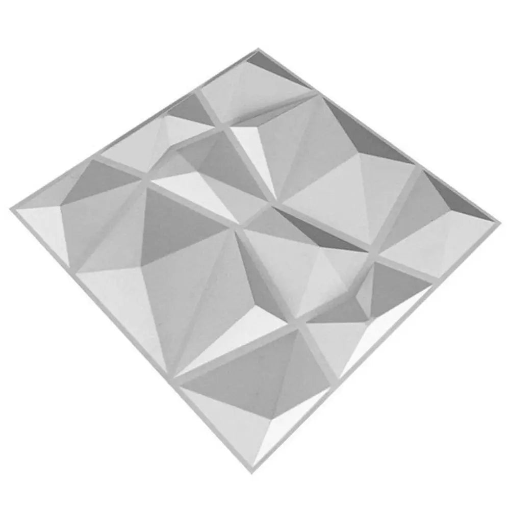 White 3D wall panel with a geometric, diamond-faceted design for a modern, textured finish.