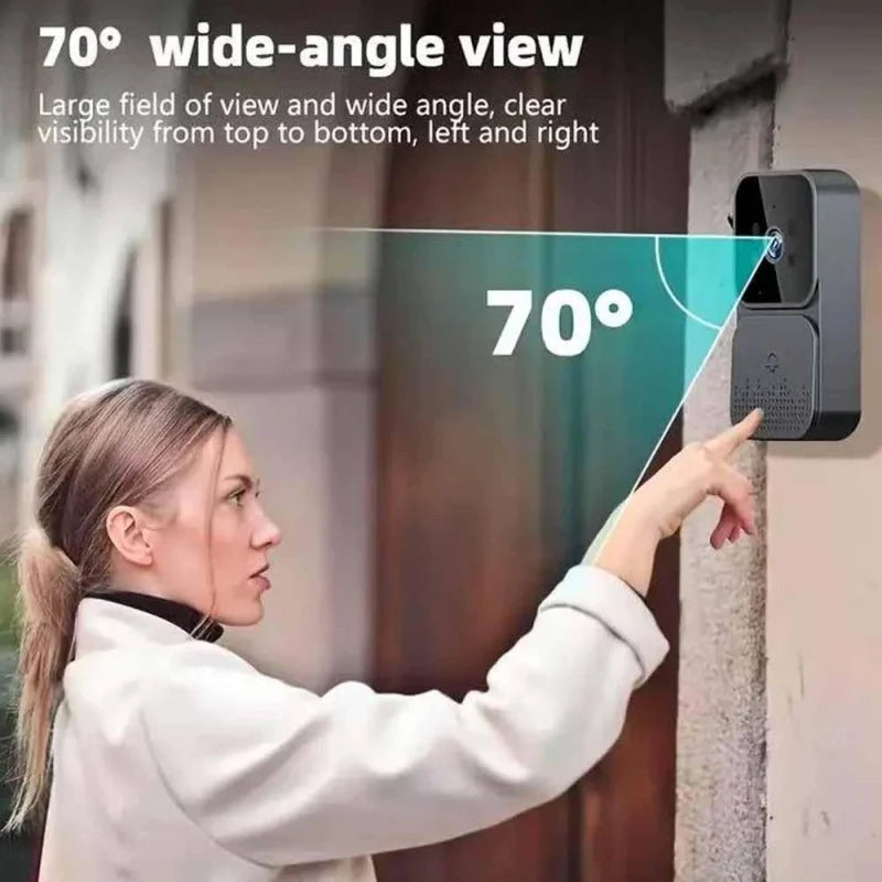 A sleek, dark grey wireless video doorbell mounted on a wall, showing a 70-degree wide-angle camera view.