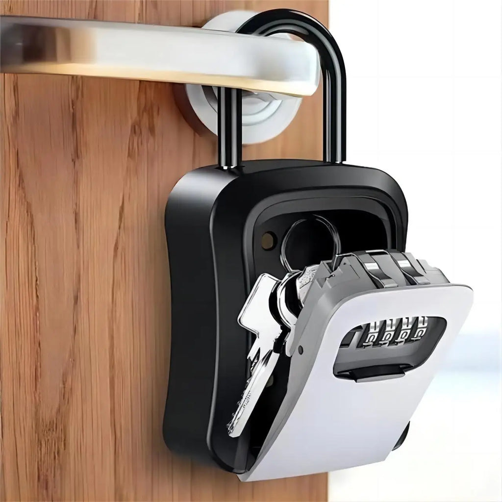 Black metal portable key lock box with a four-digit combination dial, hanging from a door handle with keys inside.